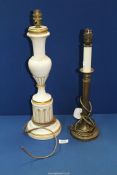 A brass Laura Ashley table lamp, 17'' tall and a white painted table lamp, 20'' tall approx..