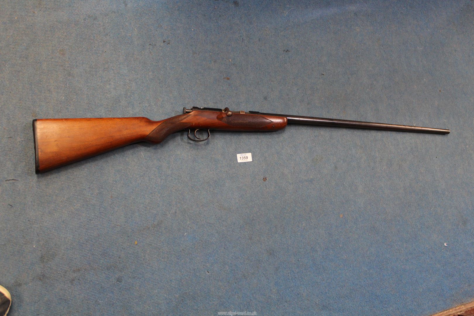 A Webley & Scott, Birmingham 25 1/2" single barrel, bolt action .