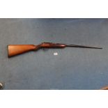 A Webley & Scott, Birmingham 25 1/2" single barrel, bolt action .