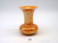 A Ruskin vase in orange lustre, 6" tall.