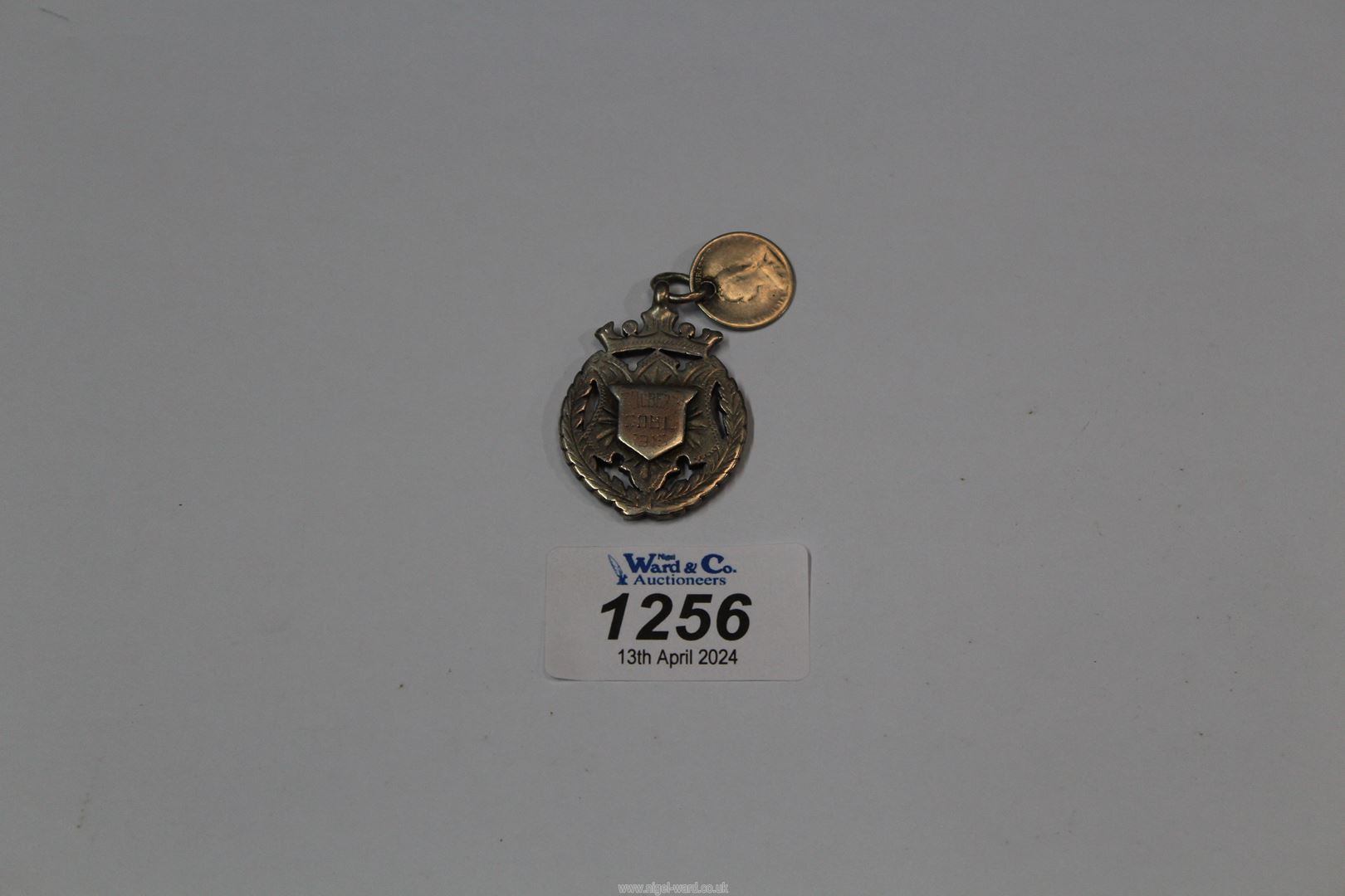 A silver Medallion, Birmingham 1913, maker William James Dingley, plus a Victorian silver 3d bit. - Image 2 of 2