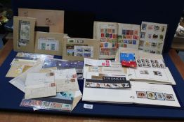 A quantity of stamps including two Royal Wedding and Anniversary stamps, stamp album,