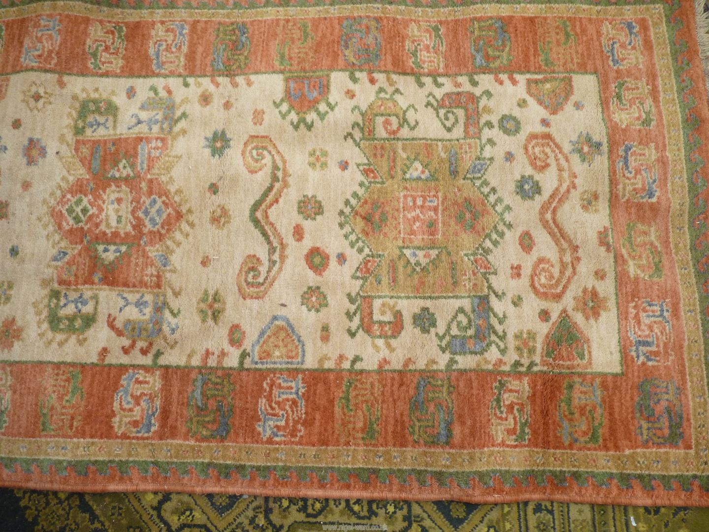 A Kabir pure wool hearth rug with borders of symbolic patterns in terracotta, - Image 2 of 3