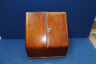 An antique Desk Tidy with two glass inkwells and lower drawer with key,