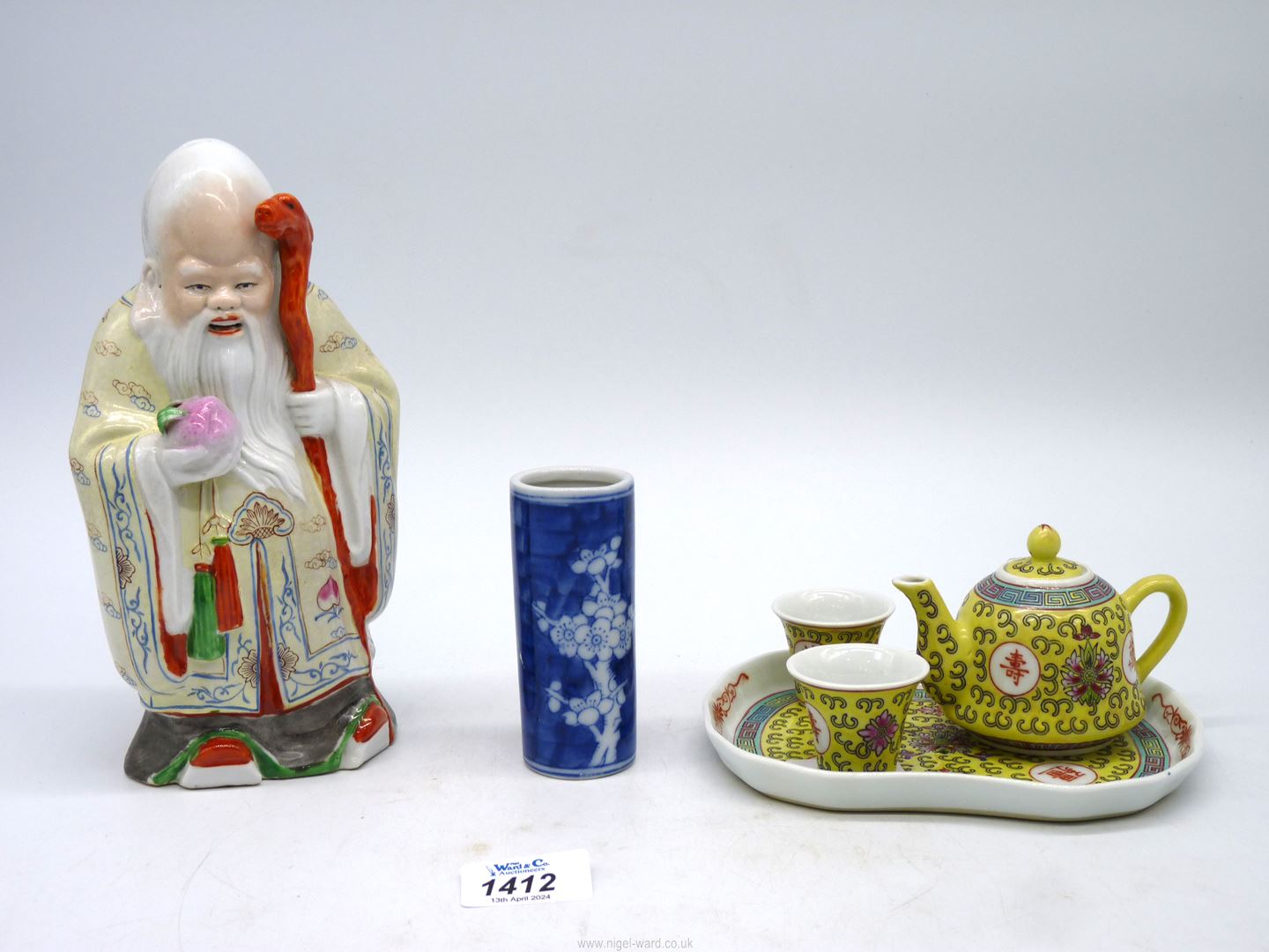 A Chinese brush pot in prunus pattern, 4" tall, large Chinese model of a Sage (Wise man),