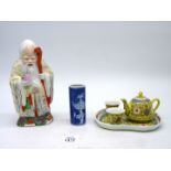 A Chinese brush pot in prunus pattern, 4" tall, large Chinese model of a Sage (Wise man),