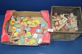 A box and a tin of vintage Lott's building Bricks.