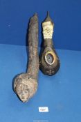 Two large and rare early 20th century ceremonial African pipes,