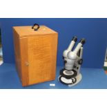 A Carl Zeiss stereo Binocular Microscope with variable magnification, old but serviceable,