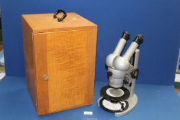 A Carl Zeiss stereo Binocular Microscope with variable magnification, old but serviceable,