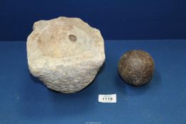 A heavy stone hewn mortar and a cannon ball, 3'' diameter approx.