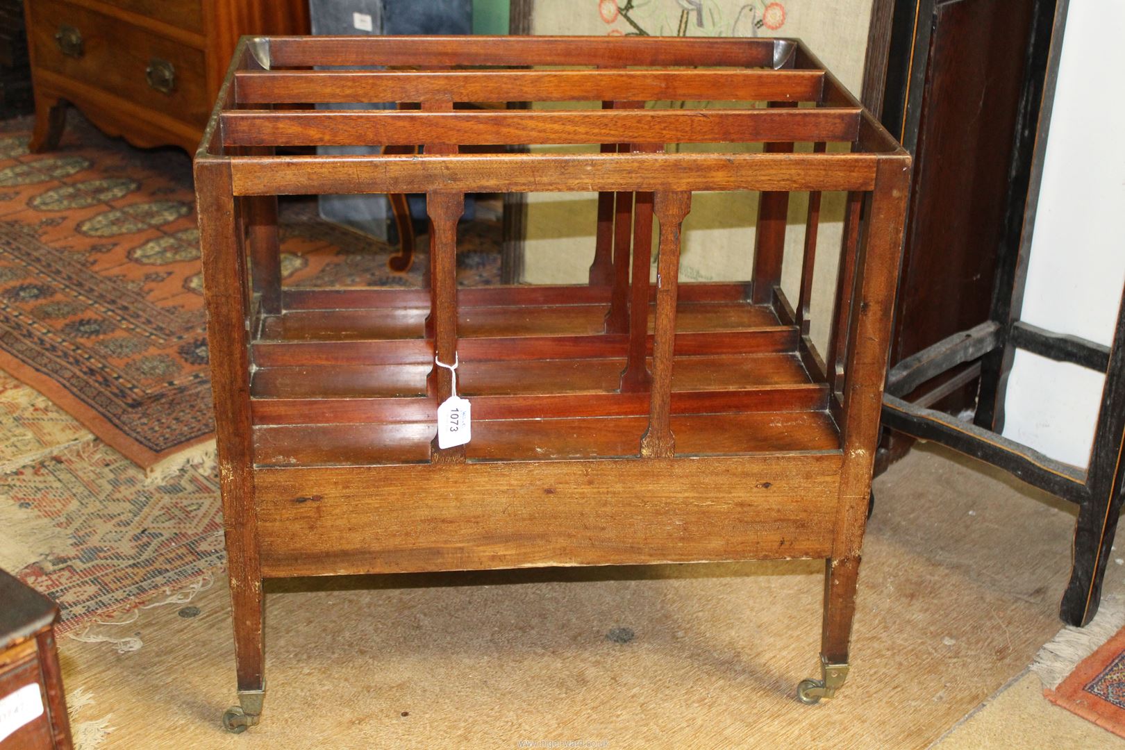 An early 19th century Mahogany three section Canterbury, 21" x 15".