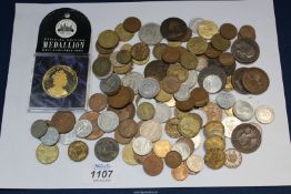A quantity of foreign and pre decimal coinage including threepenny bits, Victorian penny, Austrian,