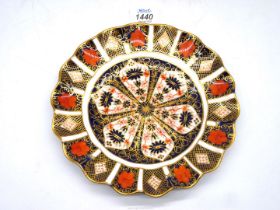 A Crown Derby fluted plate, 8 1/2" diameter.