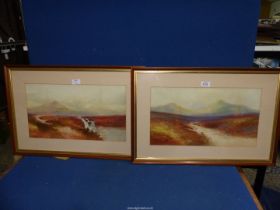 A pair of framed and mounted Watercolours depicting moorlands with peaked mountains in the distance,