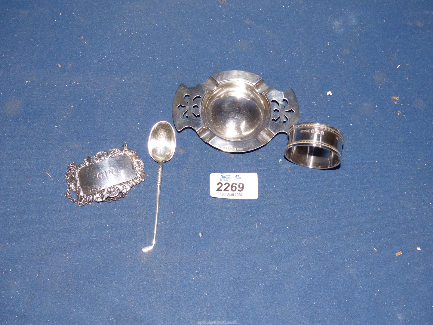 A silver decanter label for Gin Birmingham 1963, silver ashtray with pierced terminals, 4" long,