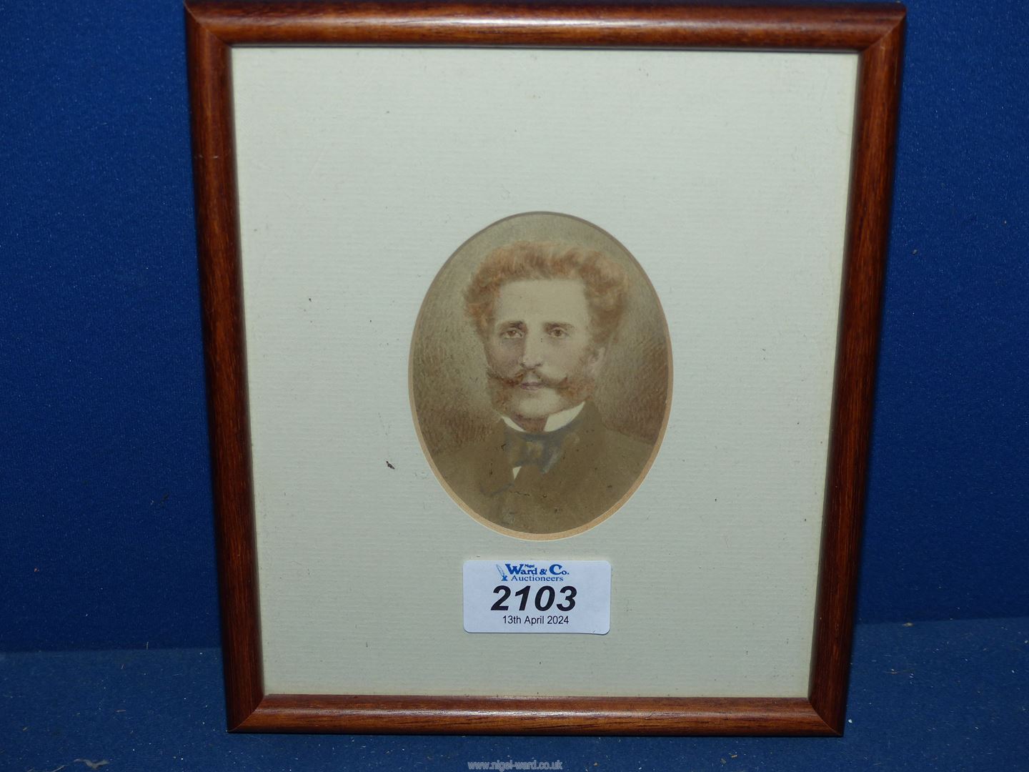 A small oval framed and mounted Watercolour portrait of a Gentleman, no visible signature.