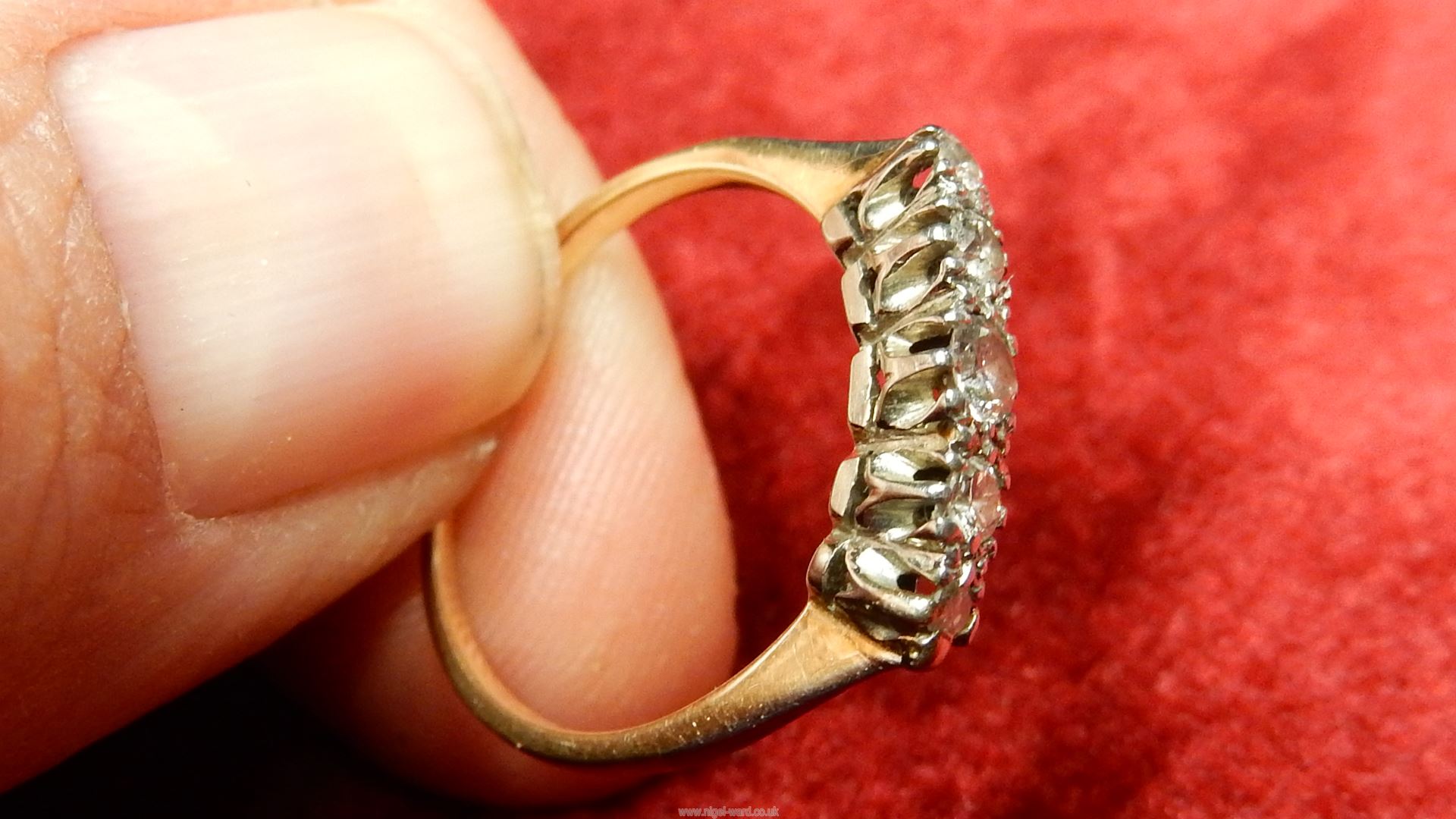 A 18ct Diamond ring having five graduated diamonds. - Image 5 of 10