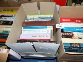 Three boxes of books to include Air War over Korea, Americans in Paris, How Parliament Works,