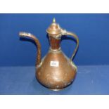 A large copper kettle in middle Eastern design, 14" tall.