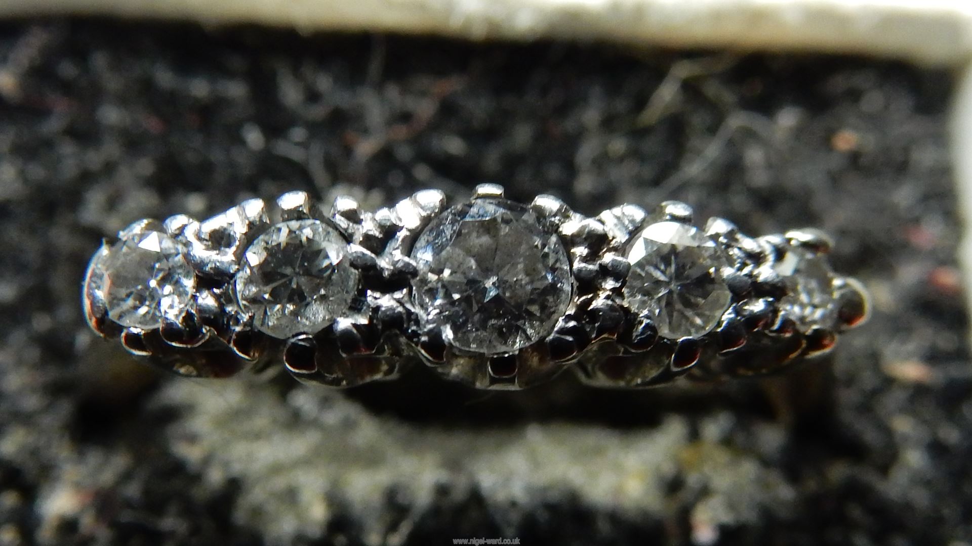 A 18ct Diamond ring having five graduated diamonds. - Image 8 of 10