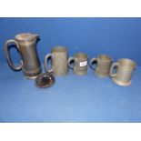 Four Pewter tankards and a plated coffee pot.