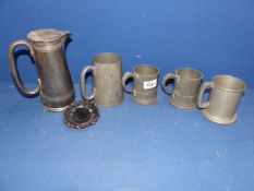 Four Pewter tankards and a plated coffee pot.