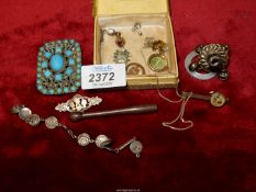 A small quantity of jewellery including a Silver Rattle a/f 925 Silver Chain and a 925 pendant,