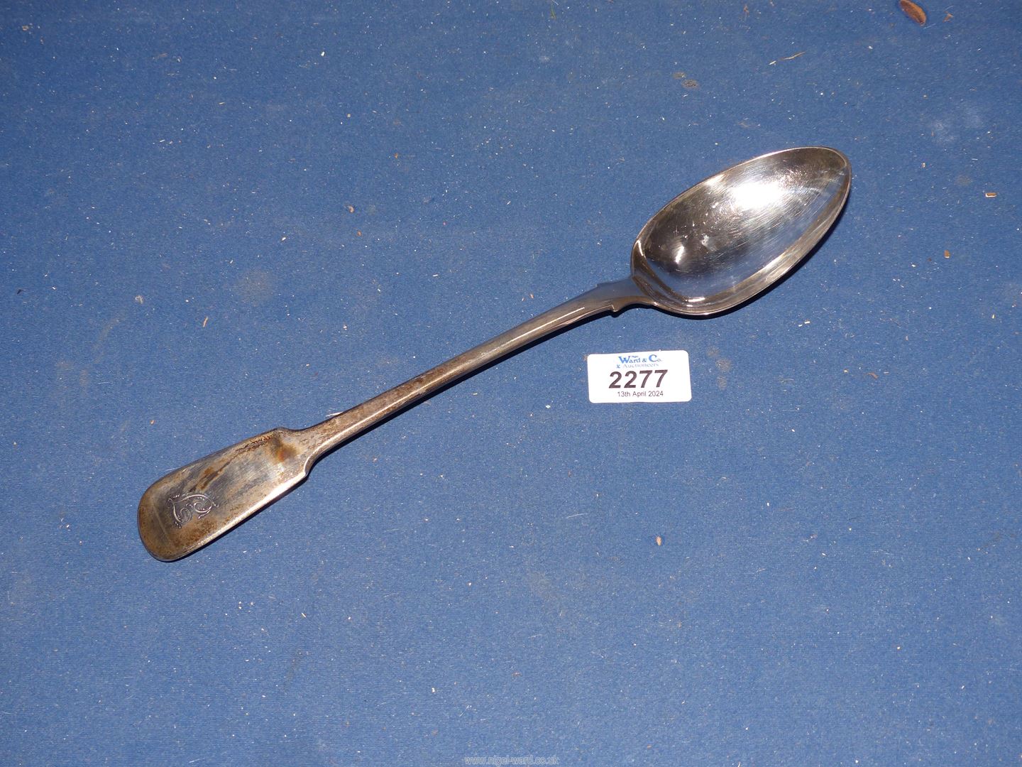 A George IV silver Basting Spoon, London 1828, makers William Eaton, 141 gms.