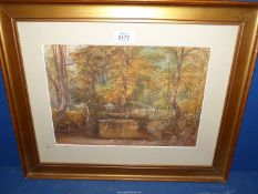 A framed and mounted Watercolour depicting a woodland scene with figures on a bridge,