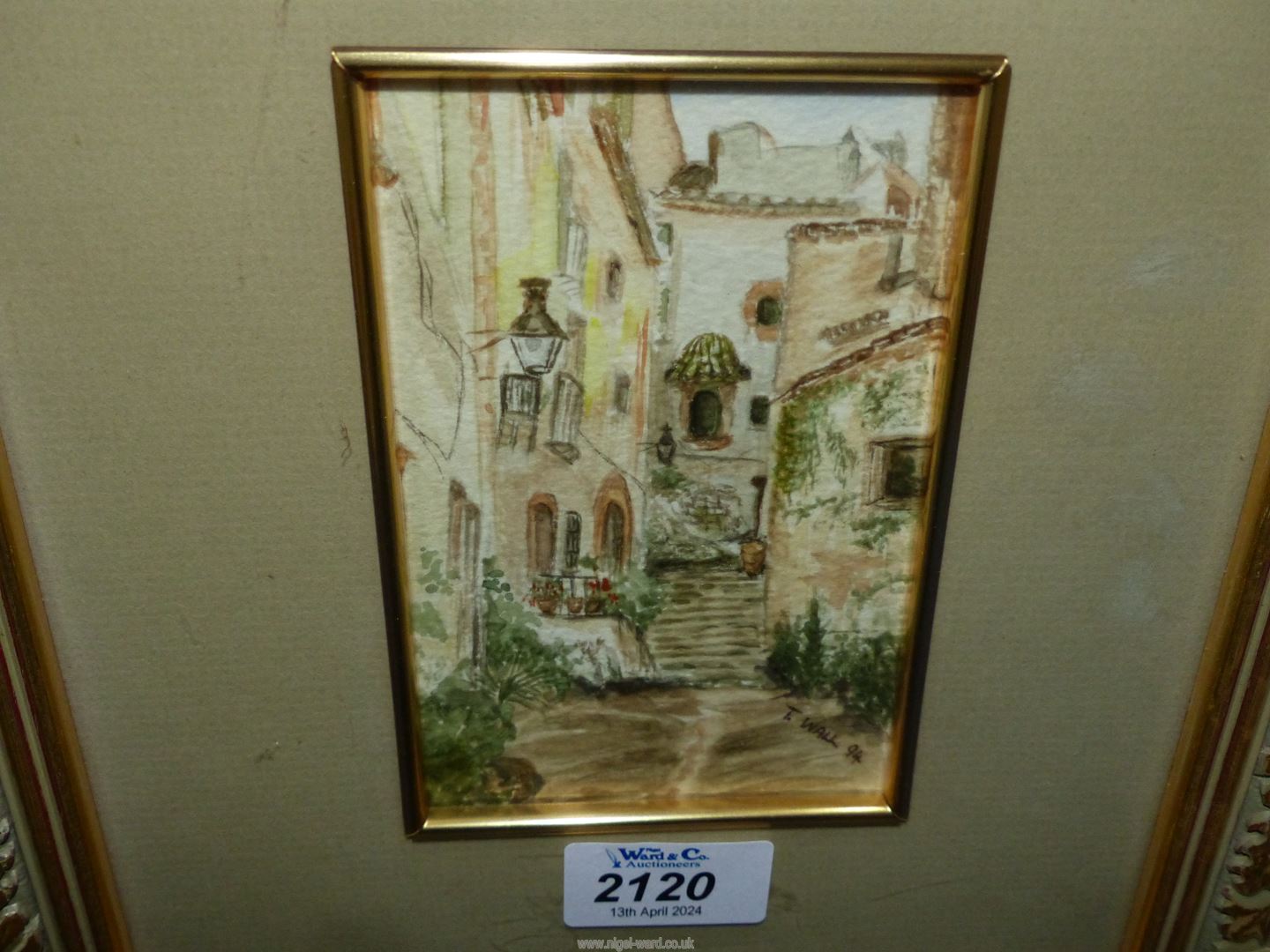 A framed and mounted Watercolour titled verso 'A Quiet Corner of Spain', signed lower right 'T. - Image 2 of 2