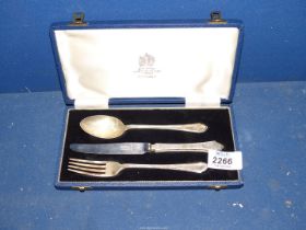 A cased Silver Christening knife, fork and spoon set, Sheffield, makers Mappin and Webb.