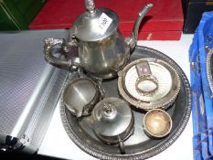 A quantity of silver plate to include; engraved tray, three piece Teaset, egg cups, napkin rings,
