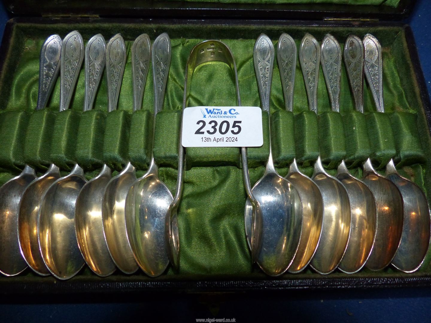A cased set of Silver sugar tongs, plus ten Teaspoons, Glasgow 1893, maker Robert Tennant & Co. - Image 2 of 3
