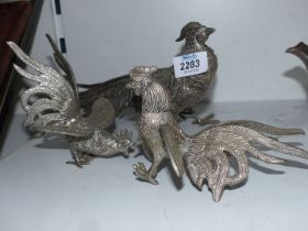 A pair of plated cock and hen pheasants, and a pair of fighting cocks.