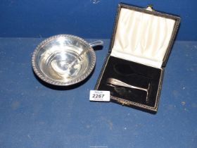 A Silver pusher, Birmingham and a sterling Silver Sauce boat and ladle.