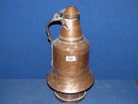 A large Copper water jug in middle Eastern design, 17" tall.