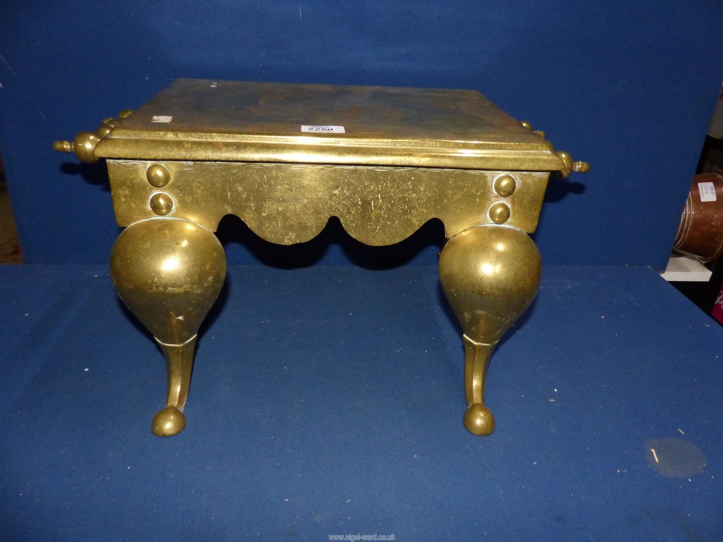 A fireside brass footman, 21" wide including handles x 10" tall. - Image 2 of 2