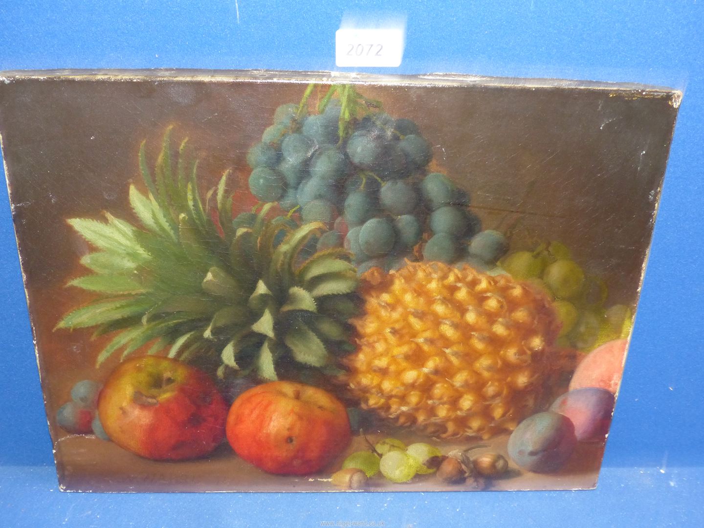 An unframed Oil on canvas depicting a still life of fruit,