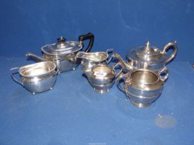 Two three piece plated teasets.