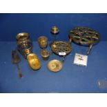 A quantity of brass including; trivets, goblet, cup & saucer, etc.