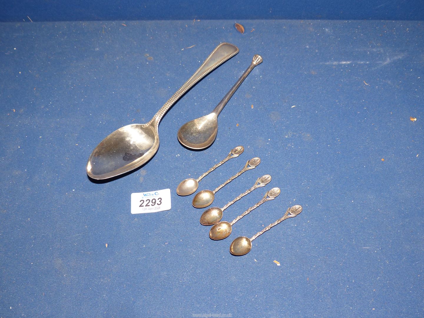 A small quantity of Silver spoons including Sheffield Silver 1899 serving spoon,