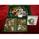 A green jewellery box and contents of bead necklaces, earrings etc.