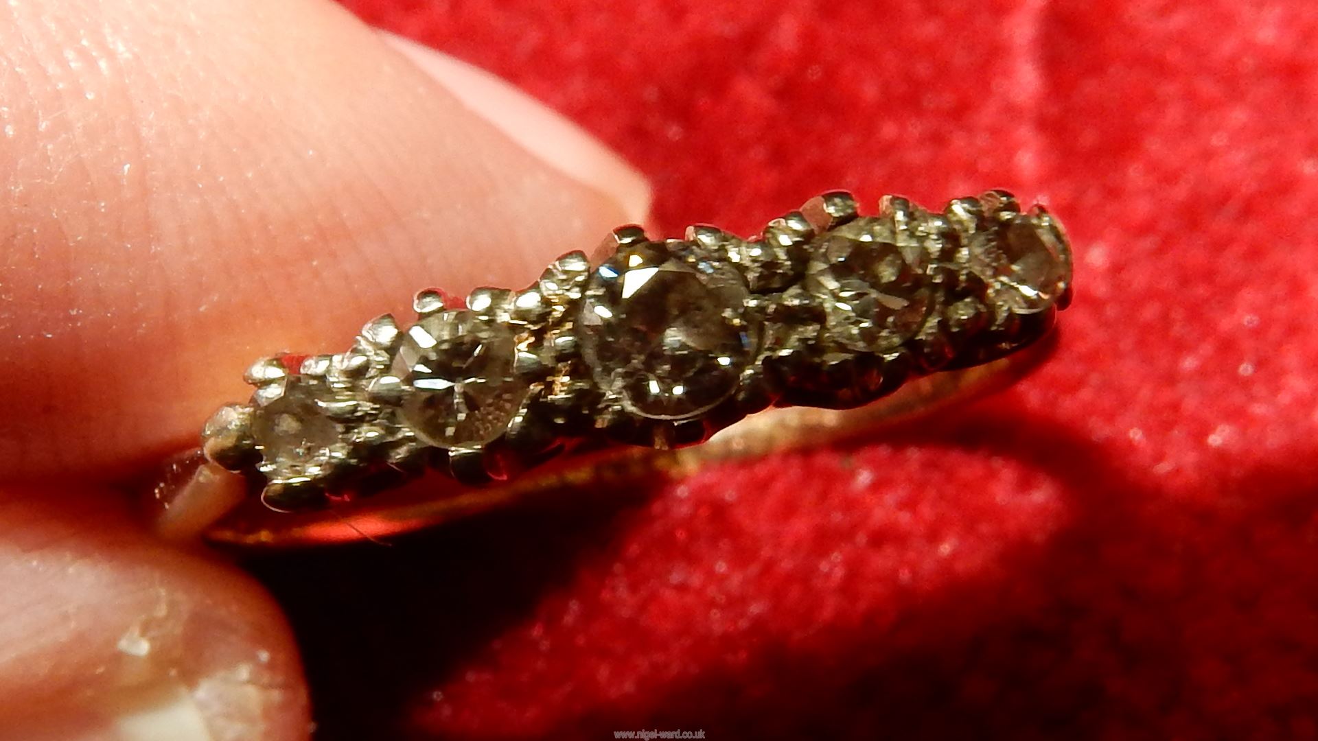 A 18ct Diamond ring having five graduated diamonds. - Image 4 of 10