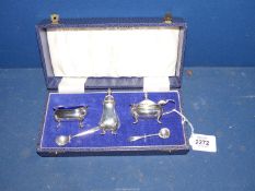 A boxed Mappin & Webb silver Cruet set complete with liners and spoons,