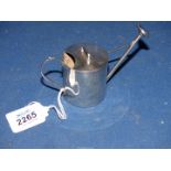 A Silver miniature Watering Can, Birmingham 1910 having some dents 69 gm.