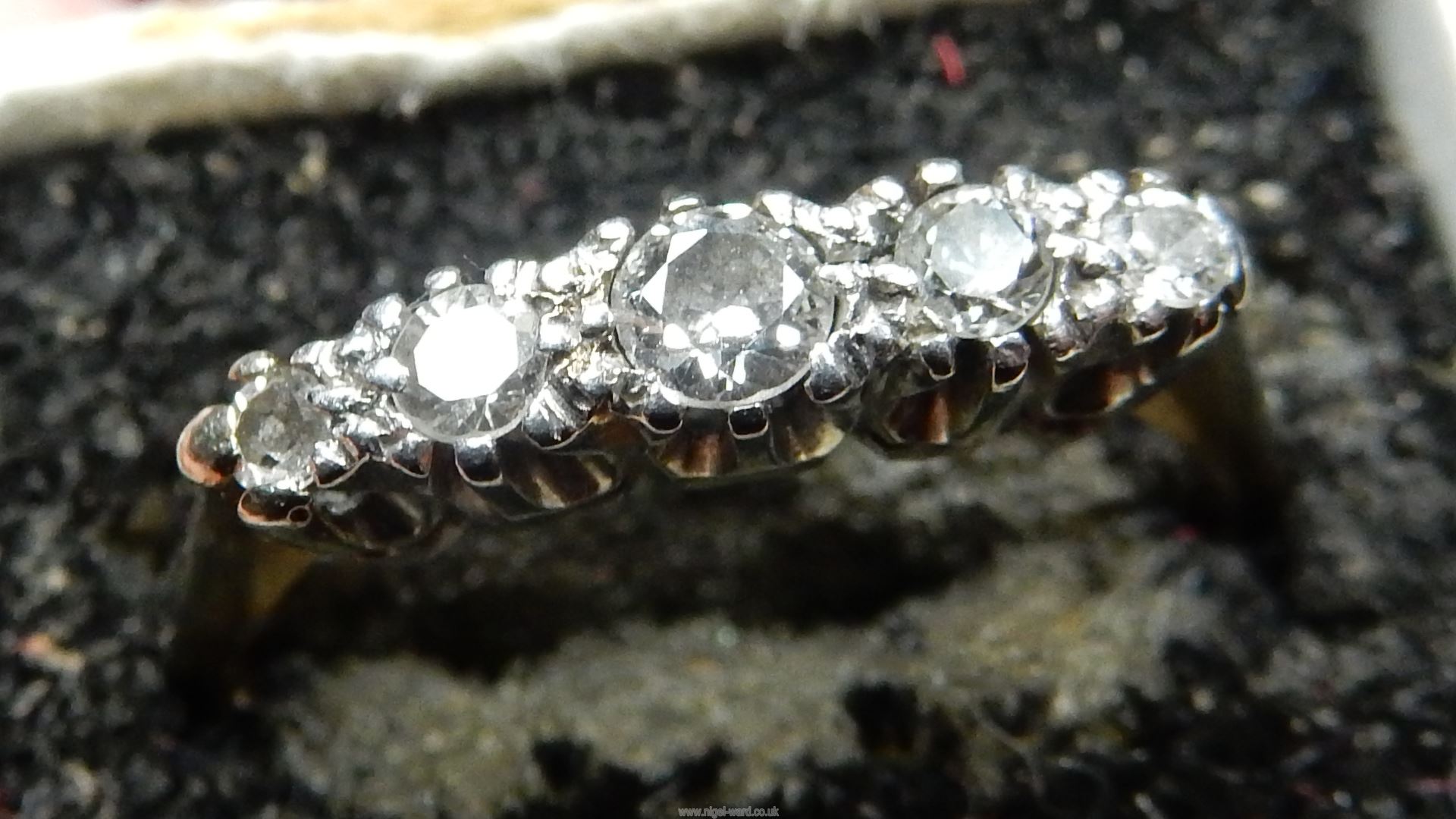 A 18ct Diamond ring having five graduated diamonds. - Image 6 of 10