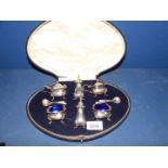 A cased Silver Cruet set (non-matching) complete with liners, the salt & pepper - Birmingham,