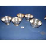 Five sterling silver footed bowls by Wallace : three with shaped edge rims.