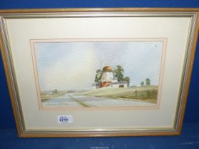 A Kenneth Moore framed and mounted Watercolour of a windmill, signed lower left.